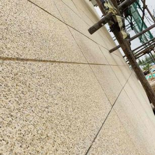 崇左 黄金麻花岗岩荔枝面外墙干挂石材效果示例