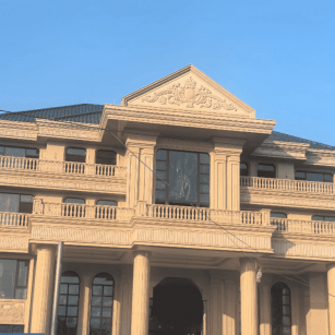 崇左黄金麻别墅外墙干挂石材效果示例